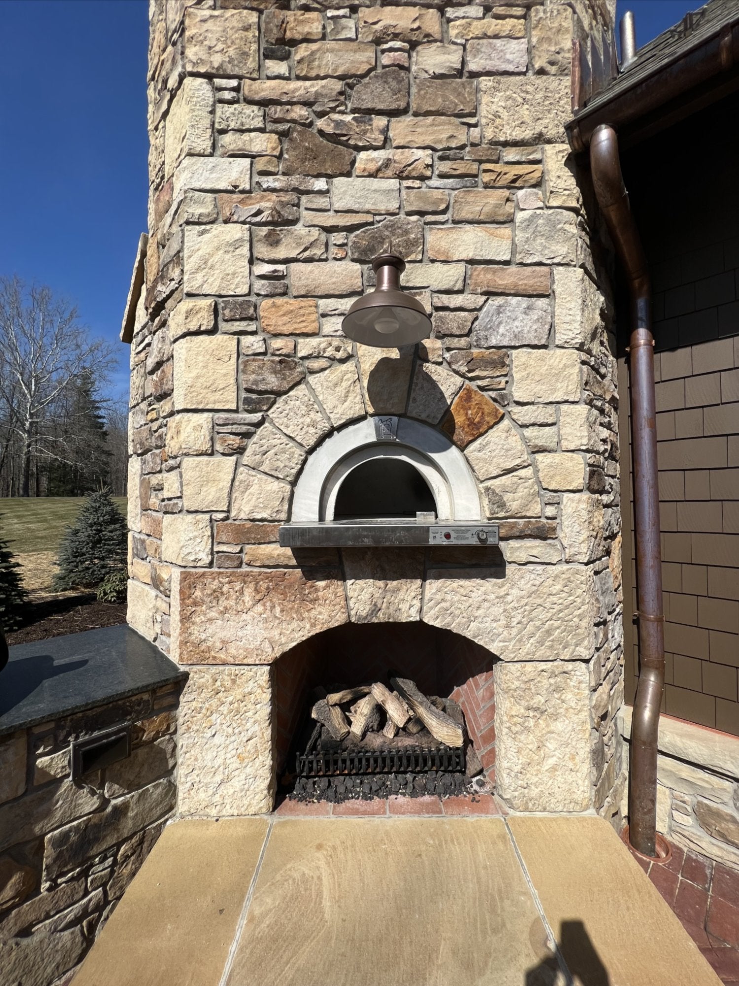 HPC Forno de Pizza Di Napoli outdoor pizza oven installed in patio kitchen
