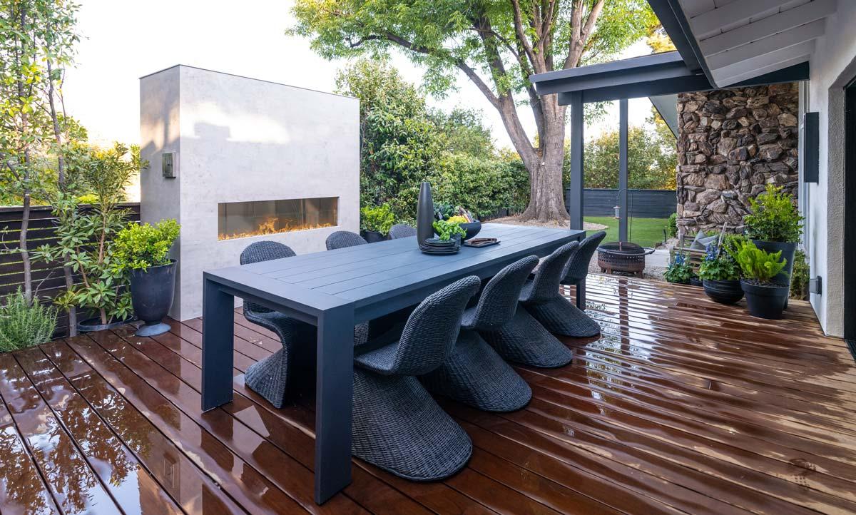 Kalea Bay 48 outdoor linear gas fireplace installed on patio wall